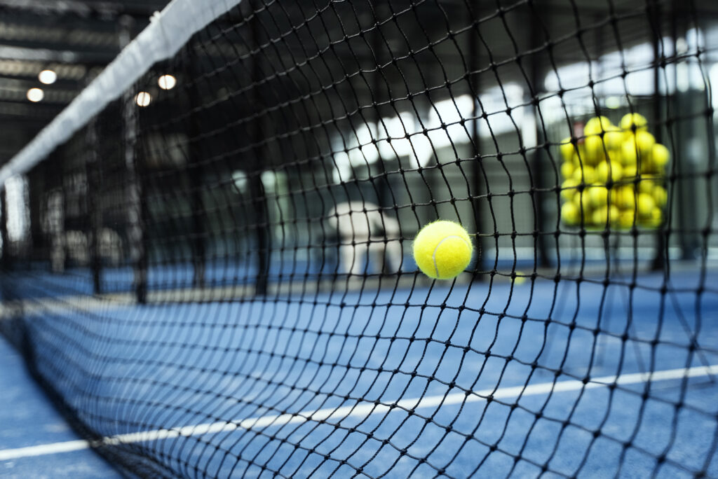 paddle-tennis-ball-hitting-net